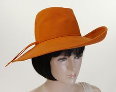 Fabulous orange picture hat by EVELYN VARON EXCLUSIVE designs.  Produced by Henry Pollack Inc., in New York.  This beauty will make you a stand-out in the crowd.  Made from "Fawn-Tra Felt", it features a 4.5" deep brim and a 4.5" tall crown.  Soooooo stylish.  This is something you should have for your personal hat collection. Labels:  Evelyn Varon Exclusive/Henry Pollack Inc.                    Year:  1950's Condition: Excellent pre-owned condition.  Good color and shape.  Clean and wearable. Felt Orange, Tall Crown, Vintage Gloves, Fancy Hats, Hat Collection, Size Label, Wide Brimmed Hats, Brim Hat, Wide Brimmed