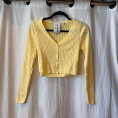 Light Yellow Cardigan Button Up. Purchased Off Asos. Never Been Worn. New Without Tags. Size: Us 6 Spring Sweater With Buttons For Day Out, Buttoned Sweater For Spring Day Out, Trendy Button Closure Cardigan For Day Out, Trendy Cardigan With Button Closure For Day Out, Yellow Sweater With Button Closure For Spring, Yellow Button Sweater For Spring, Yellow Buttoned Sweater For Spring, Casual Spring Sweater With Snap Buttons, Fitted Cardigan With Button Closure For Day Out