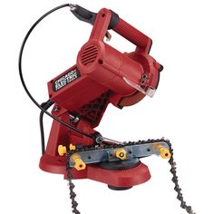 a red electric hand held tool with chains attached to the handle and two hands on each side