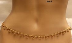 * Beautifully designed gold color belly chain. * can be used with belly dance costumes and saris. * D.no.1- Gold Belly chain high quality studded with crystals. Adjustable from 23 to 40 inches Waist. * D.no.2- Gold Belly chain high quality studded with crystals. Adjustable from 25 to 40 inches Waist. *D.no.3- gold maroon belly chain studded with crystals. Adjustable from 24 to 40 inches waist. *D.no.4-Gold belly chain high quality studded with crystals. Adjustable from 25 to 40 inches Waist. *D. Elegant Festive Waist Chain, Elegant Gold Waist Chain For Festivals, Festive Elegant Gold Waist Chain, Gold Waist Chain With Tiny Beads For Party, Waist Chain, Belly Chain, Belly Dance Costumes, Jhumka Earrings, Body Chain Jewelry