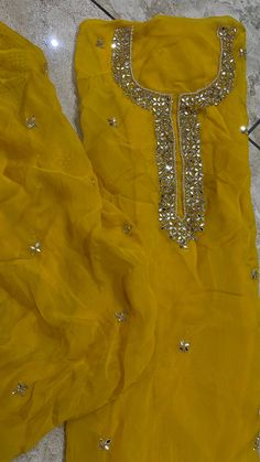 This is net dupatta with small embroidery patches and lace border on all four sides. Can be used on any suit or lehenga . Must have  dupatta in your wardrobe which can elevate the look if any matching suit or lehenga. Chinon Sharara With Mirror Work For Diwali, Diwali Sharara With Mirror Work In Chinon, Diwali Chinon Sharara With Mirror Work, Yellow Chanderi Kurta With Mirror Work, Semi-stitched Chanderi Sharara With Mirror Work, Straight Dola Silk Kurta With Mirror Work, Anarkali Dola Silk Salwar Kameez With Mirror Work, Semi-stitched Dola Silk Salwar Kameez With Mirror Work, Straight Kurta In Dola Silk With Mirror Work