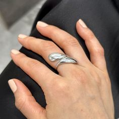 -Material: Silver, Stainless Steel Discover the exquisite elegance of our Stainless Steel Ring, a meticulously crafted piece that effortlessly embodies timeless sophistication. Handmade with precision, this Wrap Ring showcases an abstract geometric design, creating a captivating allure that seamlessly blends modern aesthetics with classic charm. -Abstract Geometric Design- The ring boasts a unique and eye-catching geometric pattern, adding a touch of contemporary artistry to your ensemble. -Chun Elegant Spiral Metal Rings, Elegant Spiral Snake Ring As Gift, Modern Spiral Rings As Gifts, Elegant Silver Spiral Bypass Ring, Modern Spiral Rings As A Gift, Modern Twist Metal Rings As Gift, Modern Spiral Promise Ring, Elegant Spiral Metal Ring Jewelry, Silver Ring With A Modern Twist And Unique Design