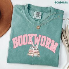 Bookworm Coquette Watercolor Comfort Colors Shirt, Coquette Book T-shirt, Reading Book Gift for Bookish, Book Lover Shirt, Librarian Tee * How To Order  1. Please, check and review all photos. 2. Choose your shirt style, size and color. 3. Click add to cart. You can go back to add more product. 4. Click "Proceed to check out". 5. When you check out, you can add a note to seller for any request. * Please check all Color, Size Charts and Shirt's Material in our product listing photos before placin Coquette Watercolor, Bookish Shirts, Bookish Clothing, Sarcastic Clothing, Shirt Coquette, Book Tshirts, Book Gift, Comfort Colors Shirt, Book Shirts