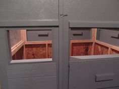 the inside of a room with some drawers in it