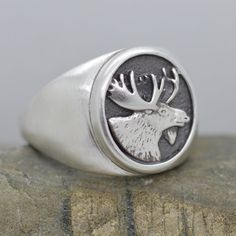 Sterling silver, good weight, cast mens ring with a Moose Head on the Front.Made out of sterling silver by our Jewelry artisan.Material: Sterling Silver 925Front width: 19mmSize see drop-down menu for availabilityStamped "925"weight: 15 gr.Comes with jewelry boxready to ship*Resizing is not available for inlaid rings. Moose Head, Plain Ring, Mako Mermaids, Plain Rings, Ring Shank, Mens Ring, Men's Rings, Blue Opal, Turquoise Sterling Silver