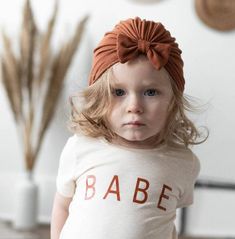 This baby turban bow hat is a perfect hospital hat for newborns as part of a coming home outfit. It is also a great unique baby gift for baby showers. Made from super soft bamboo fabric. They have a comfortable stretch of about 1.5 inches. For more colour options click here >> https://etsy.me/3xiKkNeYou might also like our topknot headbands here >> https://etsy.me/3tNNbvm or Square Knot Bows here >> https://etsy.me/2PkWIv5Fabric: 66%bamboo, 28%cotton 6%spandex>>SIZINGNewb Bow Hat Baby, Baby Bow Hats, Baby Turban Hat, Infant Hat, Baby Winter Hats, Baby Turban, Toddler Headbands, Unique Baby Gifts, Baby Bow