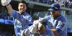 the baseball players are celebrating their victory at the game