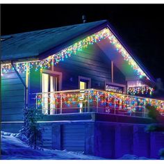 a house with christmas lights on the outside