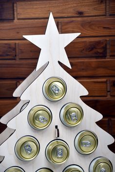 a christmas tree made out of can cans