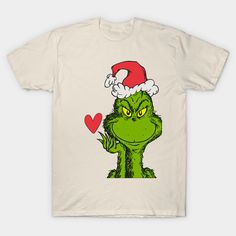 a white t - shirt with an image of the grin face wearing a santa hat