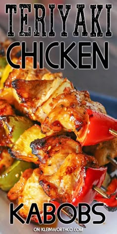 chicken kabobs on a white plate with text overlay