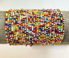 Add a burst of color to your wrist with this colorful seed bead stretch bracelet, part of a playful confetti bracelet set perfect for celebrating friendship and joy. *  Purchase multiples and save *  Made from tiny glass seed beads (2mm)  *  Available in multiple sizes *  Strung on durable beading elastic. *  Shipped to you in our recyclable packaging 🦋 YOU MAY ALSO LIKE Daisy & Dahlia Bracelets https://etsy.me/4855PlF Best Selling Seed Bead Bracelets https://etsy.me/3Q3aO01 Tila Bracelets- htt Multicolor Stretch Bracelet With Spacer And Round Beads, Multicolor Stretch Bracelet, Multicolor Stretch Bracelet With Spacer Beads, Multicolor Beaded Bracelets With Letter Beads, Multicolor Large Beaded Bracelets For Friendship, Multicolor Beaded Stretch Bracelet With Round Beads, Multicolor Round Beads Stretch Bracelet For Festival, Multicolor Bracelets With Large Beads For Friendship, Multicolor Tiny Beads Stretch Bracelet For Friendship