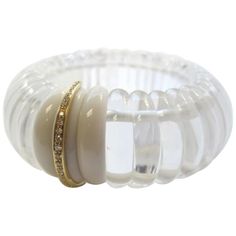 This handsome Italian cuff bracelet is made of elegant rock crystal "links" and finished with an eye-catching 18k yellow gold bar set with sparkling round brilliant cut diamonds! The combination of white, crystal and gold is refined and elegant, but the large and original design make this bracelet so fun to wear! Versatile and ready to be worn with any outfit, for any occasion! The outside dimension is 3 1/4, and the inside dimension is 2 1/2. The width of the craved crystal beads is approximately 1 1/4 inches wide and 1/4 inch thick. Diamond Bangles, Cuff Bangle Bracelet, Crystal Diamond, Diamond Bangle, Antique Diamond, Gold Bar, White Crystal, Bar Set, Rock Crystal