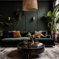 a living room with green walls and plants in the corner, including a large round coffee table