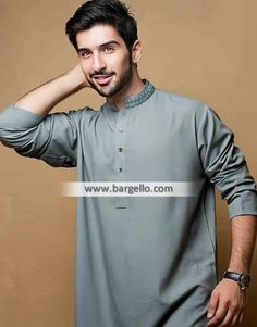 <ul> <li>Color: Cadet grey</li> <li>Scrumptious kurta features awesome embroidery on collar</li> <li>Complemented with matching shalwar</li> </ul> <p><br /><br /><strong>Additional Accessories:</strong><br />Peshawari Sandal: <strong>US$50</strong><br />Men's Shawl: <strong>US$50</strong></p> Traditional Gray Kurta For Eid, Gray Traditional Wear For Eid, Traditional Gray Wear For Eid, Gray Embroidered Kurta For Eid, Embroidered Gray Kurta For Eid, Festive Long Sleeve Gray Kurta, Fitted Gray Kurta For Eid, Gray Fitted Kurta For Eid, Gray Cotton Kurta For Eid