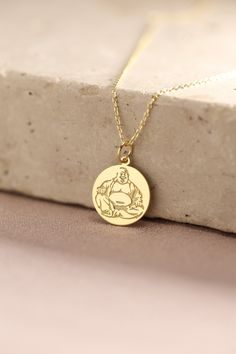 Gold Budai Pendant - Budai Gold Necklace ● Material of pendant: Solid Gold 14k ( REAL GOLD ) ● Metal Stamp: 14k ( REAL GOLD ) ● The pendant is available in 5 sizes: - 12,7 mm / 0.5 inches (Diameter) - 14,0 mm / 0,55 inches ( Diameter ) In the photos - 15,3 mm / 0.6 inches ( Diameter ) - 16,5 mm / 0,65 inches ( Diameter ) - 19,1 mm / 0,75 inches ( Diameter ) ( In the photos the size is 14mm / 0.55 inches Diameter ) ( Jump Ring inner diameter: 4 mm ) ● Material of chain: Solid gold 14k ( REAL GOLD Yellow Gold Amulet Coin Necklace As Gift, Engraved Round Necklace For Good Luck, Spiritual Yellow Gold Coin Necklace As Gift, White Gold Coin Necklace For Gift, Symbolic Gold Plated Coin Necklace, Yellow Gold Coin Necklace With Charms As Gift, Yellow Gold Coin Necklace With Charms For Gift, Yellow Gold Coin Charm Necklace As Gift, Spiritual Round Coin Necklace As Gift