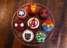 the cupcakes are decorated like superheros