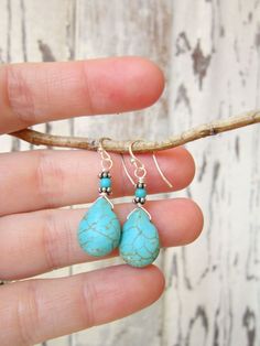 "These pretty turquoise drop earrings will quickly become an everyday favorite. Sterling silver wire wraps around the tops of these howlite briolettes and then dangle from a sterling silver earwire. They measure 1 1/2\" from the top of the earwire. See more earrings in my shop here: https://www.etsy.com/shop/JensBeadBox?section_id=10618715&ref=shopsection_leftnav_5 All my jewelry comes gift boxed with a bow ready for gift giving, whether it is a gift for you or someone special. Thank you for Wire Wrapped Turquoise, Earrings Patterns, Turquoise Drop Earrings, Earrings Wire, Beaded Earrings Patterns, Sterling Silver Wire Wrap, Earrings Turquoise, Turquoise Howlite, Earring Patterns