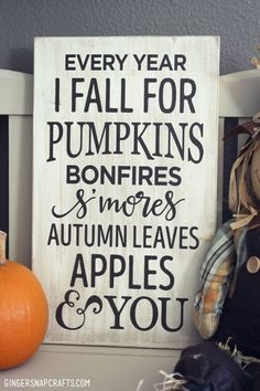 a wooden sign that says every year i fall for pumpkins and more autumn leaves apples and you