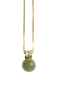 This elegant Esther necklace features a classic pendant with a zircon centerpiece and moss-green nephrite jade. Crafted from a gold-plated box chain, this timeless necklace is perfect for any occasion and is sure to be your everyday statement piece. Bead: nephrite, diameter 7mm Zircon: 3mm x 3mm Box chain: gold-plated, length 440mm Zircon Necklace, Nephrite Jade, Jade Necklace, Green Necklace, Green Jade, Jade Green, Moss Green, Box Chain, Statement Pieces