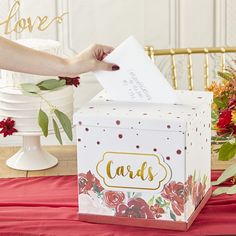 Our Burgundy Blush Floral Collapsible Card Box is a rustic wedding gift box that is a unique addition to your reception. Designed with rich fall floral colors, this receiving box is a one of kind. In lieu of receiving gifts on your registry, your friends and family can place money and gift cards into the receiving box at any time during your ceremony. This collapsible box can be set up with ease and taken home at the end of the night to enjoy your gifts and messages of encouragement. The beautiful blossom theme is great for an autumn celebration whether your party is indoors or outside. Choose a wedding gift card box for your guests to show their appreciation without worrying about picking out the perfect gift from your registry. Kate Aspen is the place to find high quality decorations, pa Messages Of Encouragement, Wedding Gift Card Box, Traditional Wedding Gifts, Floral Themed Wedding, Receiving Gifts, Bridal Shower Card, Green And Burgundy, Rustic Wedding Gifts, Greeting Card Box