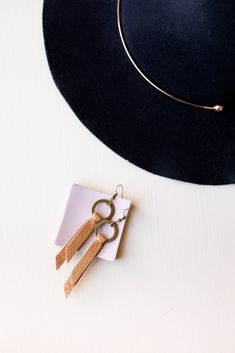 Add these light, simple and stunning modern leather dangle earrings to any wardrobe for an everyday look. Can be dressed up or down. Finished with a classic french wire in antique brass finish. Chic Brown Earrings For Everyday Wear, Chic Everyday Brown Earrings, Chic Brown Everyday Earrings, Boho Drop Earrings, Wristlet Keychain, Maize, French Wire, Chloe Drew, Cute Earrings