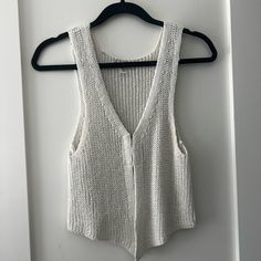 Nwot Urban Outfitters Knit Tank Top Size Medium Took The Tag Off And Never Wore White Chunky Knit V-neck Top, White Cotton Knit Sweater Vest, Casual Knitted Sweater Vest For Spring, Casual White Open Knit Sweater Vest, Casual Fitted Knit Sweater Vest, White Sleeveless Knit Cardigan, Summer Casual Knit Cardigan, White Chunky Knit Cotton Top, White Chunky Knit Top For Spring