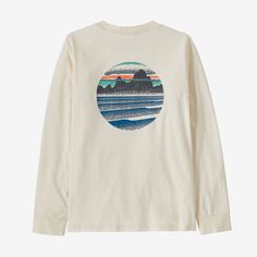 Made of soft 100% Regenerative Organic Certified® cotton with a timeless, universal fit, it's a basic t-shirt designed for getting dirty and having fun. Made in a Fair Trade Certified™ factory. | Patagonia Kids' Long-Sleeved Skyline Stencil T-Shirt in Undyed Natural, Large - Kids' Shirts & Tops - Regenerative Organic Certified Cotton/Pfas White Organic Cotton Tops With Front Print, White Organic Cotton Top With Front Print, Everyday Long Sleeve Graphic T-shirt, Organic Cotton Graphic Print Top, Relaxed Fit Organic Cotton Top With Screen Print, Patagonia Long Sleeve Cotton Tops, Everyday Organic Cotton Screen Printed Tops, Everyday Organic Cotton Tops With Screen Print, Patagonia Graphic Cotton T-shirt