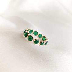 This stunning ring is set in 14k Solid Yellow Gold with Natural Emerald with utmost precision. It is an unique dainty gemstone ring for nearly every occasion and is completely hassle-free jewelry. 🔷ABOUT GEMSTONE:  Emerald is often associated with love and romantic relationships. It is believed to promote love, loyalty, and unity, making it a popular choice for engagement and anniversary jewelry. Emerald is often associated with abundance and financial success. It is believed to attract prosper Elegant Green Stackable Rings With Bezel Setting, Green Jewelry With Bezel Setting And Round Band, Adjustable Bezel Set Emerald Ring Gift, Green Birthstone Ring With Bezel Setting, Open Design, Green Birthstone Ring With Bezel Setting, Green Birthstone Ring With Bezel Setting And Open Shape, Emerald Jewelry With Bezel Setting In Round Band, Adjustable Emerald Ring With Bezel Setting For May Birthstone, Elegant Stackable Emerald Rings With Bezel Setting