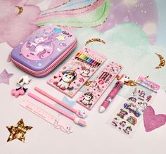 the contents of a pink hello kitty stationery set