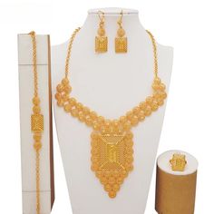 Luxury Dubai Gold Color Jewelry Sets African Bridal Wedding Flower Jewelry Sets Necklace Bracelet Earrings Ring Set Lady Gift Origin: Mainland China Metals Type: Copper Alloy Style: TRENDY Model Number: 1005004298533963 Included Additional Item Description: Earring, Necklace,Bangle,Ring Occasion: Wedding Shape\pattern: Flower Gender: Women Material: Metal Fine or Fashion: Fashion Jewelry Sets Type: Necklace/Earrings/Ring/Bracelet Item Type: Jewelry Sets Elegant Gold Bridal Accessories For Festivals, Gold Bridal Accessories For Festivals, Gold Bridal Accessories For Festive Occasion, Gold Bridal Accessories For Wedding And Festivals, Elegant Bridal Sets For Traditional Ceremonies, Gold Bridal Accessories With Intricate Design For Marriage, Gold Bridal Accessories With Intricate Design For Wedding, Elegant Yellow Jewelry For Marriage, Gold Sets With Intricate Design For Marriage