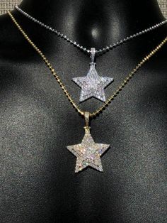 "Custom made super iced out STAR PENDANT. Made from 100% Solid 925 Sterling silver and finished in your choice of either Rhodium or 14k yellow gold. Adorned with 200 micro paved simulated diamonds (CZ) to give this piece an amazing super icy look! Measures approximately 1.25\" x 1.25\" and weighs approximately 8 grams. You can buy pendant only or with choice of 18-30\" 2.5mm diamond cut ball moon chains IF YOU WANT PENDANT ONLY, SELECT \"0\" Chains are also solid sterling silver and come with a Dazzling Star-shaped White Gold Necklace, Dazzling Star Shaped White Gold Necklace, Dazzling White Gold Star Necklace, Sparkling Star-shaped White Gold Jewelry, Dazzling Silver Star Jewelry, Sparkling Silver Star-shaped Jewelry, Sparkling Silver Star Jewelry, Sparkling Silver Starburst Jewelry, Dazzling Star-shaped Jewelry Gift