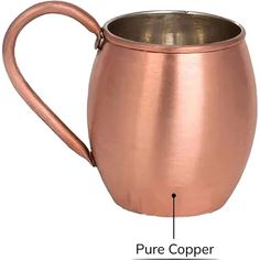 an image of a copper colored coffee mug with measurements for the handle and bottom part