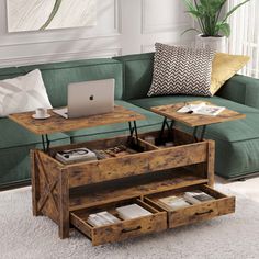 a living room filled with furniture and a laptop computer on top of a coffee table