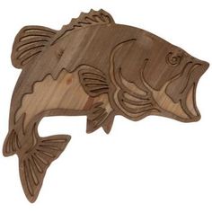 a wooden cutout of a fish on a white background