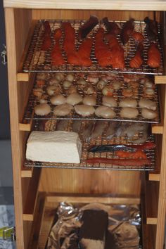 an assortment of baked goods displayed on shelves