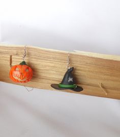 Halloween earrings, pumpkin earrings, witch hat earrings, Halloween jewelry, Halloween accessories, Halloween party, orange jewelry, Carved pumpkin,Halloween Costume, gift for her, cute earrings, funny earrings, Jack o lantern Halloween pumpkin earrings witch hat earrings I made of polymer clay. The pumpkin also used clay, which accumulates light and glows in the dark. The charging process-glow a continuous. When the glow dimmed, you need to hold the pumpkin cutouts to any bright light source 5- Novelty Orange Earrings For Halloween, Witch Hat Earrings, Pumpkin Cutouts, Earrings Funny, Pumpkin Halloween Costume, Orange Jewelry, Funny Earrings, Carved Pumpkin, Jewelry Halloween