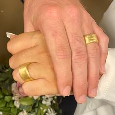 Organic form meets expert craftsmanship with this stunning solid 14K gold unisex wedding band. A subtle yet sensational statement, this piece has an apparent weight and impressive width with naturally undulating sides and a rough-textured surface. Each ring is handcrafted and one of kind just like the singular union they represent. ◈ DETAILS Weight: 5g Width: 9.5-11.5 mm / 0.37''-0.45'' Thickness: 1-2.5 mm / 0.039''-0.1'' ◈ MATERIAL 14K Solid Gold ◈ ALSO AVAILABLE IN 14K Yellow, Rose, or White G Classic Wide Band Signet Ring For Wedding, Wedding Signet Ring With Polished Finish And Open Band, 14k Gold Wide Band For Anniversary, Elegant Thick Band Engraved Wedding Ring, Polished Open Band Dome Ring For Wedding, Modern Engraved Ring With Thick Band For Wedding, Modern Engraved Thick Band Ring For Wedding, Wedding Dome Ring With Polished Finish And Open Band, Engraved Wide Band Ring With Polished Finish For Weddings