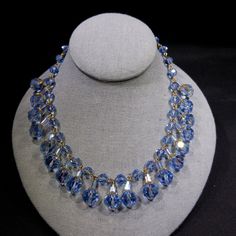 *Description: This is a beautiful blue aurora borealis crystal beaded necklace from the 1960s. This is a unique design with 19 found faceted crystal light blue AB beads which hang from the necklace with a matching glass tube bead above it. The necklace itself is made with 32 smaller matching light blue AB crystal beads in graduating sizes for the extension chain. This is a beautiful necklace which will be a collectible piece for years to come. This would be a great addition to your vintage jewel Dangling Necklace, Beaded Projects, Crystal Beaded Necklace, Blue Aurora, Blue Aurora Borealis, Aurora Borealis Crystal, Crystal Bead Necklace, Floral Bracelet, Beaded Jewellery