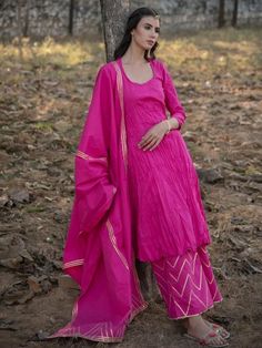 Set of 3 consists of kurta, farshi and dupatta. Painting you in the colors of the festive season with a bold Fuschia fashi set Kurta: A crushed cotton kali kurta Dupatta: A cotton dupatta with minimalistic gota work Pants: A farshi pajama bottom complete with gota lehar work Fit: Fitted at bust and waist. Falls below the knee. Wash Care Instructions: Dry Clean Only Note: Available in other colors The product will be shipped within 15-20 days of the order placed Finished Garment Measurement Chart Dupatta Painting, Palazzo Kurta, Kurta Set For Women, Gota Work, Fuschia Pink, Cotton Dupatta, Measurement Chart, Pajama Bottoms, Kurta Set