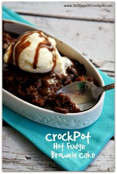 crockpot hot fudge brownie cake with ice cream on top and spoon