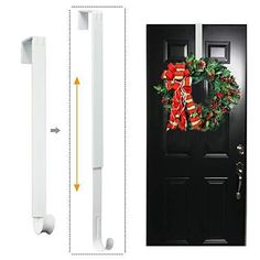 the front door is decorated with christmas wreaths and ribbons, along with an open white plastic door handle