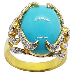 Turquoise 6.41 carats with Diamond 0.50 carat Ring set in 18 Karat Gold Settings Width: 1.6 cm Length: 1.6 cm Ring Size: 53 Total Weight: 7.61 grams "We first opened doors in 1980 when it was then situated in the vicinity of the Victory Monument; a small and modest storefront with a couple of counters. From its humble beginnings to where it stands today, our company has proven its abilities as a jeweler. Since the beginning, we have been supplying fine quality pieces to dealers, wholesalers and Blue Diamond Cabochon Ring, Blue Cabochon Diamond Ring, Blue Diamond Ring With Cabochon Cut, Luxury Turquoise Jewelry With Center Stone, Luxury Turquoise Gemstone Ring, Luxury Turquoise Cabochon Ring In Yellow Gold, Luxury Yellow Gold Turquoise Cabochon Ring, Luxury Oval Turquoise Ring, Luxury Turquoise Diamond Ring