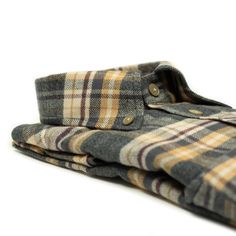 "Checked flannel shirts are staples of any man's closet, whether dressed up with a tweed jacket or for casual days. This version uses a luxurious Italian cotton flannel with a soft hand, a superb color palette and the right check scale. I'm a ?? fan."---Greg Details 100% cotton fabric of Italian origin; medium weight flannel Buttoned collar - 4cm high, 9.5cm points, 1.5cm tie space Handsewn and shanked matte mother-of-pearl buttons with "crow foot" stitching Hand-attached sleeves, hand-sewn deta Attached Sleeves, Button Collar Shirt, Men Closet, Handmade Shirts, Flannel Shirts, Popover Shirt, Shirt Maker, Denim Cotton, Blue Check