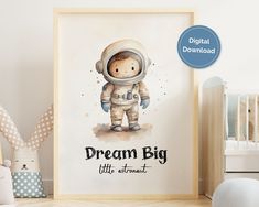 a baby's room with a poster on the wall that says, dream big little astronaut