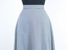 Item Description This is a gorgeous 90s cotton check skirt by Apostrophe! I absolutely love how the check pattern is made up of both white and black, and so it has a nice light gray tone when looking at it from far away. This skirt has an a-line almost circle skirt shape with a gorgeous high rise, and pockets!! Such a classic and timeless piece with a super flattering fit, that will be versatile for styling. I love the extra buttons on the waistband. They have a super cute look as they are, and Chic Fitted Plaid Skirt, Plaid A-line Skirt With Lining, Plaid Skirt For Summer Workwear, Plaid Workwear Skirt For Summer, Spring Plaid Skirt For Work, Fitted Cotton Plaid Skirt, Spring Fitted Houndstooth Skirt, Fitted Full Skirt In Plaid, Plaid Cotton Skirt For Work