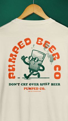 a white t - shirt with an orange and green print on it that says, barreld beer co don't cry over split beer