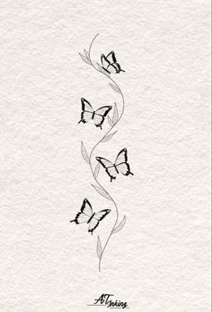 three butterflies flying in the air on top of a white piece of paper with black ink