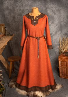 The dress has simple medieval cut with long sleeves, loose and comfortable. The historical pattern - an important element when playing historical realities, especially Vikings or Slavs. Put on your cloak and travel back to the Middle Ages. Hunting, ancient legends, the warmth of the hearth and our dress will give you an unforgettable experience. The simple cut of the dress allows you to move freely, as well as boldly add accessories to the dress. The dress will perfectly fit into the basic wardr Viking Style Long Sleeve Medieval Dress For Larp, Fall Medieval Dress With Long Sleeves, Fall Medieval Dress With Historical Design, Long Sleeve Medieval Dress With Historical Design For Fall, Vintage Long Sleeve Medieval Dress For Larp, Viking Style Long Sleeve Medieval Dress For Festivals, Fall Dresses With Historical Design, Viking Style Medieval Dress For Winter, Viking Style Medieval Dress Costume For Winter