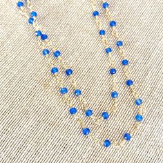 Tiny beads necklace rosary style with either blue chalcedony or sapphire. Length Blue Chalcedony 18" Length Sapphire 19" Blue Sapphire crystals have an excellent energy within the throat chakra to aid your communication ability. Blue chalcedony is an all-around healer of the physical body. It's energies mainly focus on your throat health. -This information is intended for spiritual support only Chalcedony beads 3mm Sapphire 3-3.5mm Throat Health, The Throat Chakra, Tiny Beads, Gemstone Beaded Necklace, Gem Necklace, Throat Chakra, Blue Chalcedony, Beads Necklace, Rosary